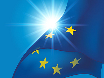 Europe flag against blue sky